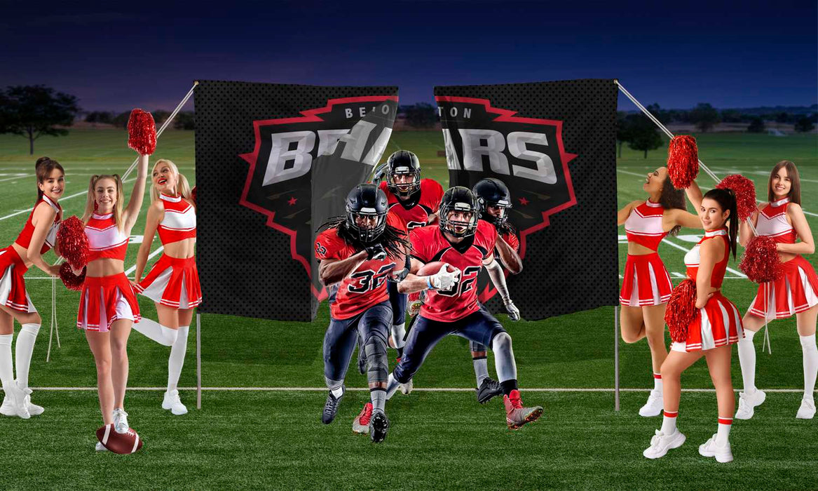 Football team running through custom tear away banner.